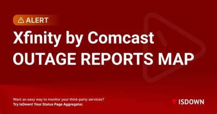 How do I report a business outage to Comcast?