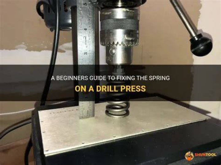 How do you fix the spring on a drill press?