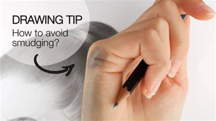 How do you keep your pencil from smudging when drawing?