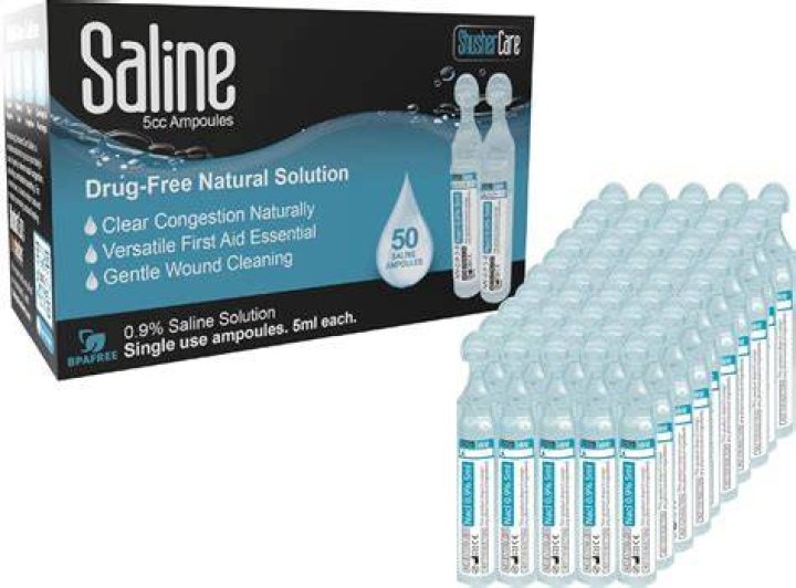 Is it safe to use saline solution in a nebulizer?