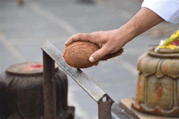 What does breaking a coconut mean?