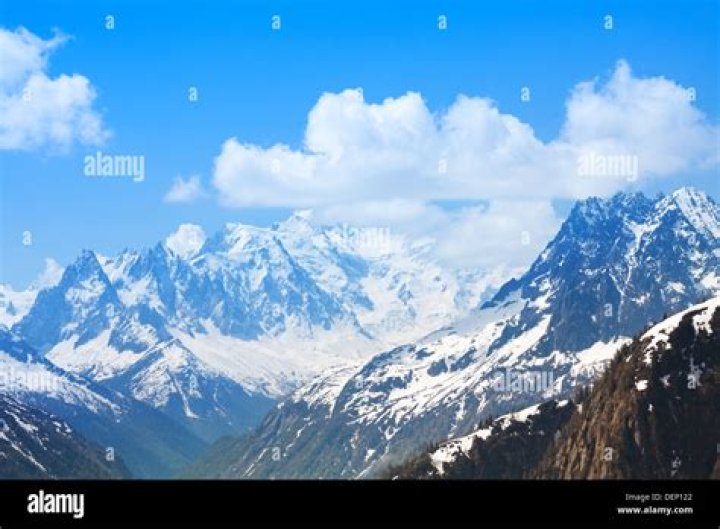Which mountain range separates France and Switzerland?