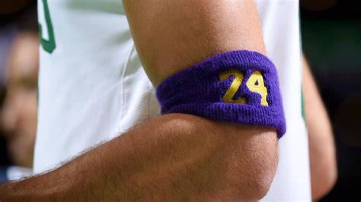 Why did Kobe wear an elbow band?