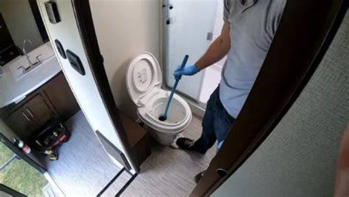 Why does my RV toilet keep filling up with water?
